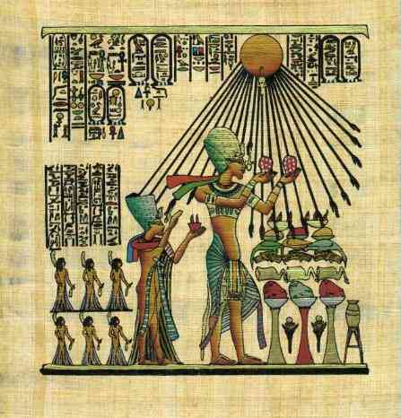 Akhenaton, facing right, under the rays of Aton the sun disk, holding the fruits of the harvest